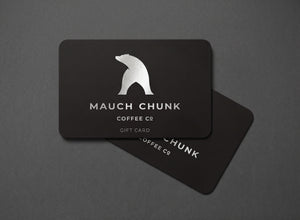 Black gift card with white bear logo and text on a dark gray background